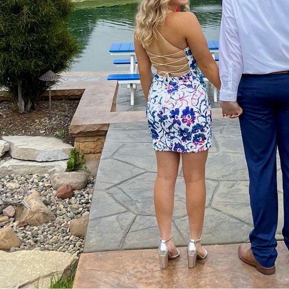 This is a Jovani size 2 sequin dress. Colors are mainly pink/blue iridescent - Picture 3 of 5